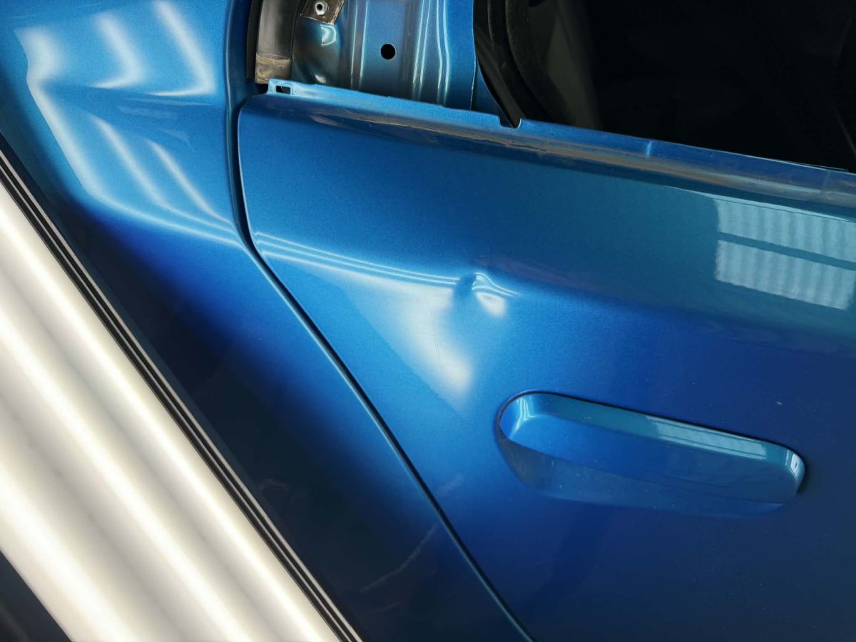 Panel crease before PDR repair Hobart Tasmania