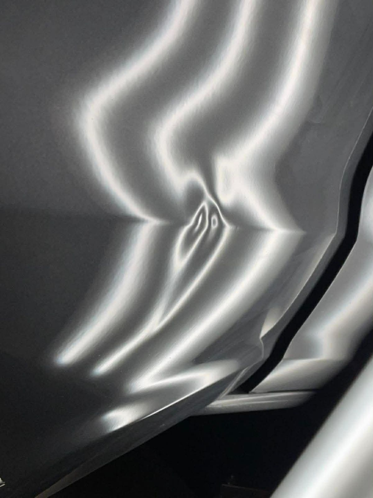 Panel crease before PDR repair Hobart Tasmania