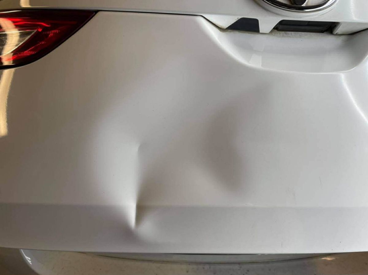 Panel crease before PDR repair Hobart Tasmania