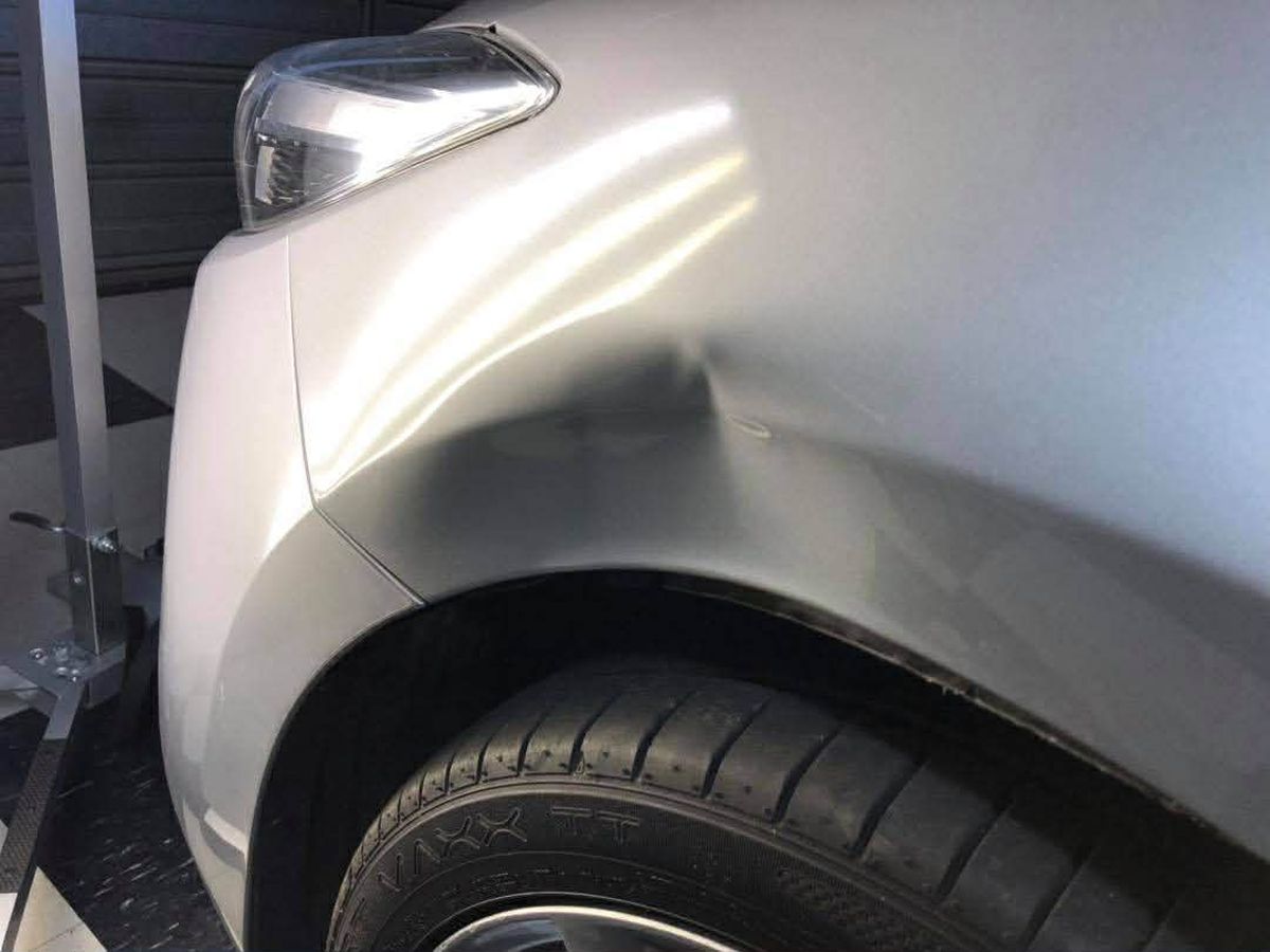 Panel crease before PDR repair Hobart Tasmania