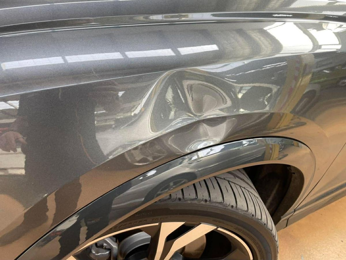 Panel crease before PDR repair Hobart Tasmania