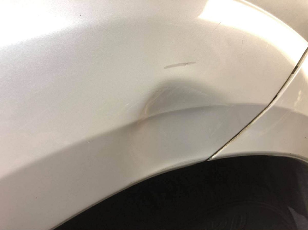 Panel crease before PDR repair Hobart Tasmania