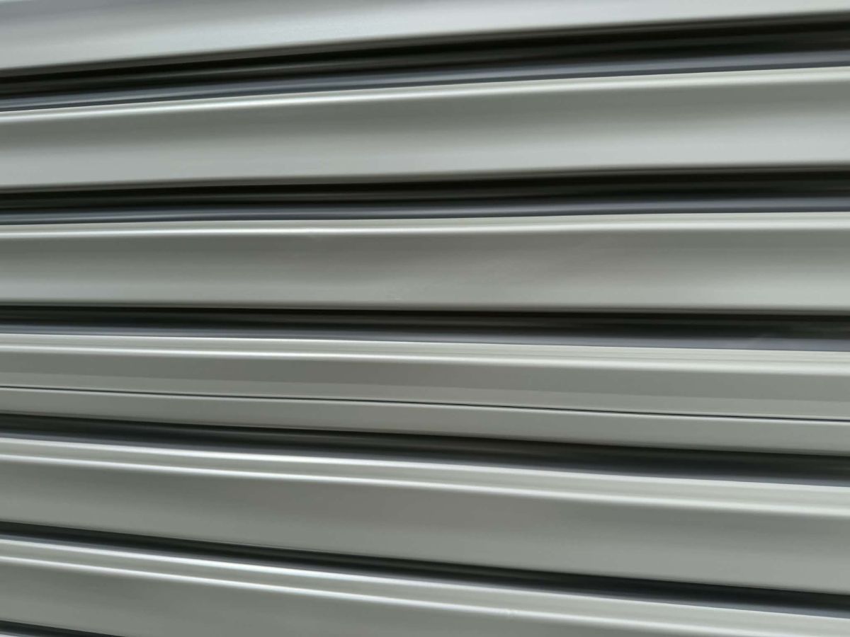 Garage roller door dent after repair Hobart