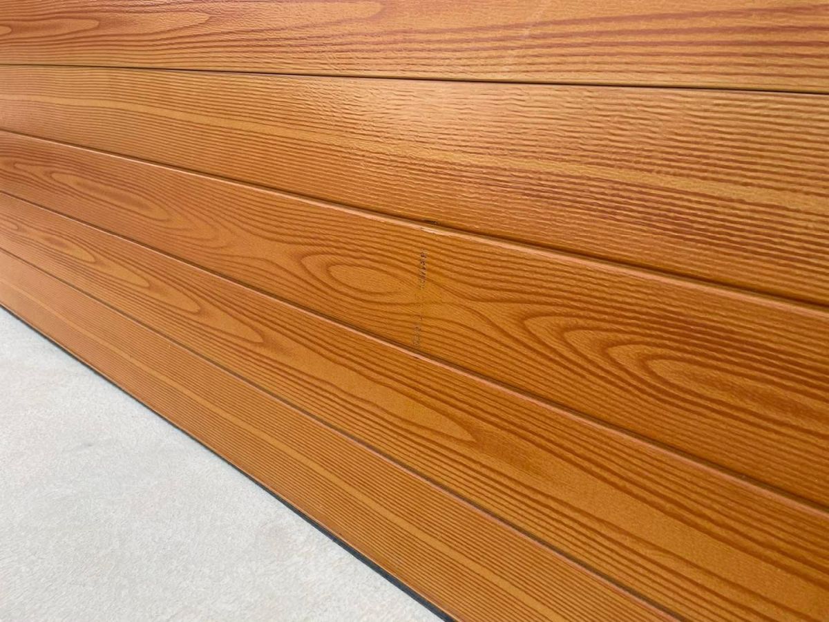 Garage roller door dent after repair Hobart